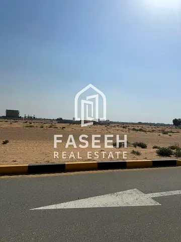 A spacious plot of land in Muzairah, Al Rahmaniya, close to the main road and mosque, ready for construction.