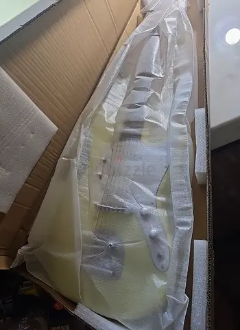 Brand new electric guitar (still in protective packaging) - Ivory finish