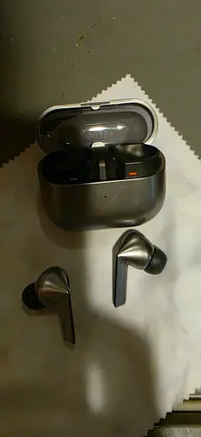 Used wireless Bluetooth earbuds original with charging case - good working condition