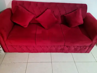 Red velvet 3+1-seater sofa with cushions - good condition