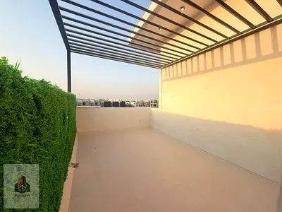 Luxury modern townhouse for sale in Al Helio 1 – Ajman | Two floors plus a roof terrace | Near Safeer Mall | Opposite amenities | Registration and own