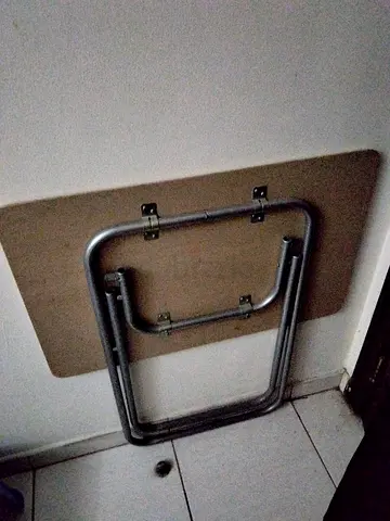 Foldable rectangular folding table with metal legs