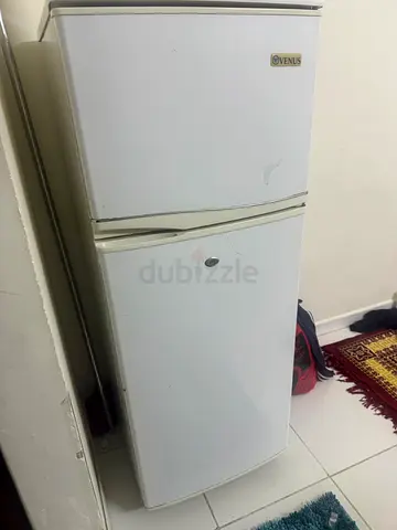 White two-door refrigerator - good working condition