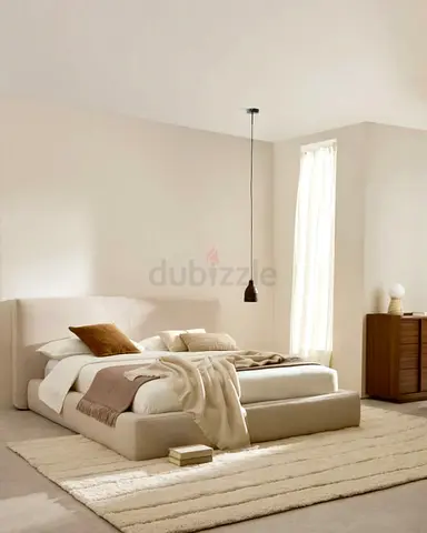Plush Upholstered King Bed with Padded Headboard and Footboard