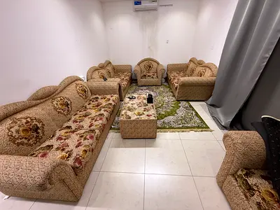 7-piece beige patterned living room sofa set with coffee table
