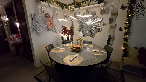 Round dining table with 6 chairs — modern marble-look top