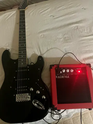 Black Electric Guitar with Small Practice Amplifier - Ready to Play