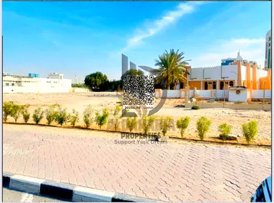 موقع استثنائي أمام الجمعية التعاونية | أرض سكني تجاري تملك حر للبيع في الراشدية 3 – عجمان!