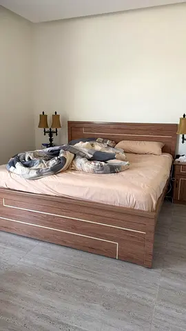 Wooden double bed frame with headboard - good condition