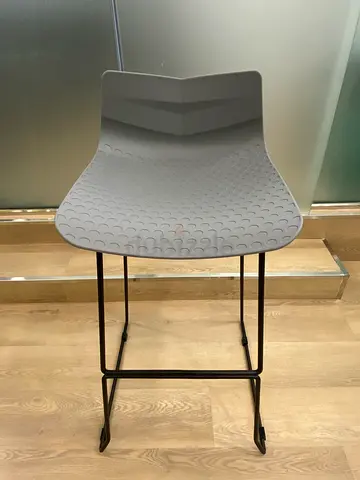 Modern grey plastic dining/side chair with metal frame - single piece