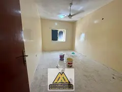 Apartment for Annual Rent in Al Mowaihat 2, Ajman Separate Living Room | AED 25,000 per Year
