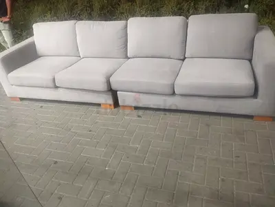 Light grey 4-seater fabric sofa in good condition
