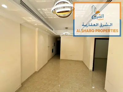 Two-bedroom apartment with a living room in Al Rawda, Sheikh Zayed Street, opposite Kenz Mall. First-time occupancy (brand new).