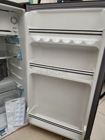 Single-door fridge in good working condition - compact unit
