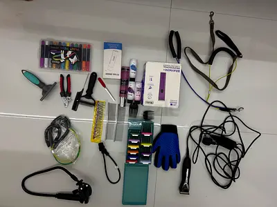 Mixed pet grooming tools and accessories kit - clippers, brushes, leashes, table..