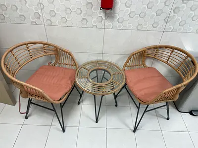 Two rattan armchairs with glass-top side table (Can be used outdoor) - set of 3