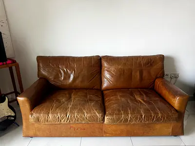 Vintage brown leather 3-seater sofa, well-used with character