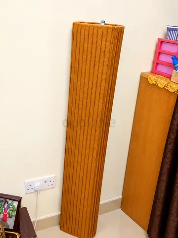 Rolled mustard/gold modern area rug - good condition
