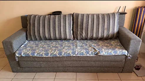 3-seater grey fabric sofa cum bed- good condition, comfortable