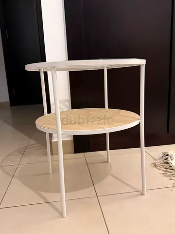 Small round two-tier side table - white frame, light wood shelves