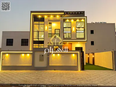 Luxury family villa for sale in Al Helio, Ajman, featuring a modern design, four master bedrooms, a majlis, and two living areas. The price includes r