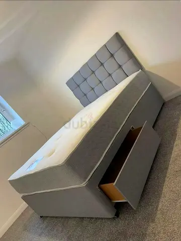 Grey fabric divan bed with storage drawers and headboard - Double