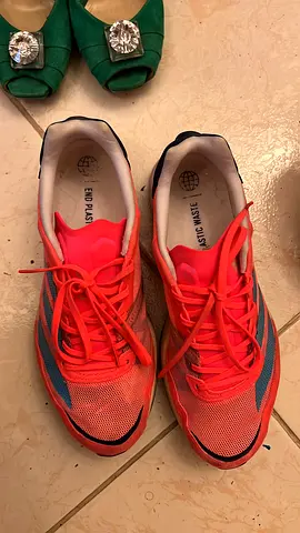 Lightly used coral pink running shoes, size 39 (pair)