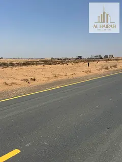 Two adjacent residential plots for sale in Al-Hoshi, Sharjah – Prime location and excellent price