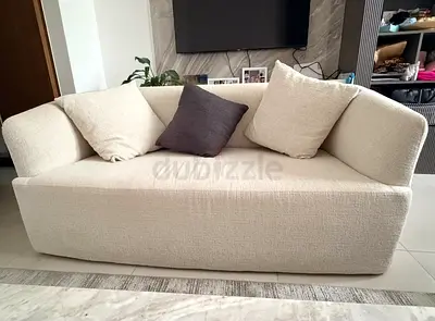 2-Seater Sofa with 3 Cushions – Good Condition