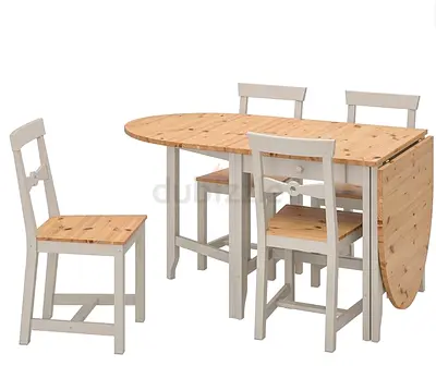 Wooden drop-leaf dining table with 4 chairs - compact space saver