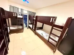 Executive bedspace available karama adcb