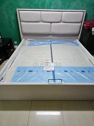 Queen upholstered bed with mattress - like new