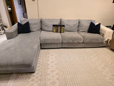 Gray sofa with covers