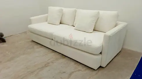 Neat and clean crate and barrel sofa