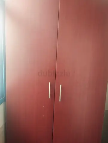 Two-door wooden wardrobe in good condition (cherry finish)