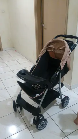Lightweight beige/black standard baby stroller in good condition