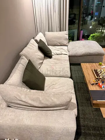 Modular Pan Emirates pianca feather filled sofa with footstool