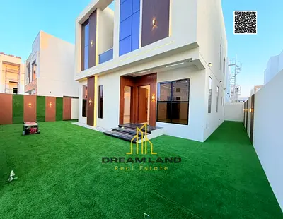 A luxurious family villa for sale in Al Zahia, Ajman, featuring a modern design and spacious interiors. It includes four master bedrooms, a majlis, an