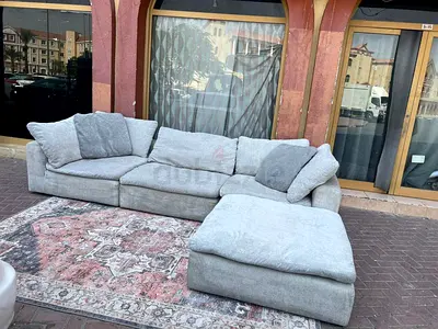 Perfect condition ___pan Emirates Pianca sofa with footstool