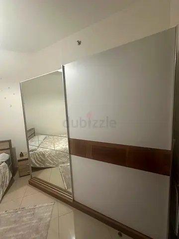 White & wood sliding wardrobe with mirror - good condition