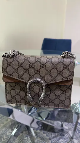Gucci Dionysus GG Supreme Small Shoulder Bag, with the beige/ebony monogram, brown suede detailing
