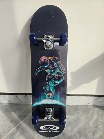 Brand new Runner complete skateboard with astronaut graphic