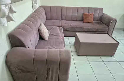 Urgent sale…L-shaped velvet sectional sofa with ottoman - good condition