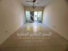 Spacious 2BR Central AC Balcony in Um Tarafa