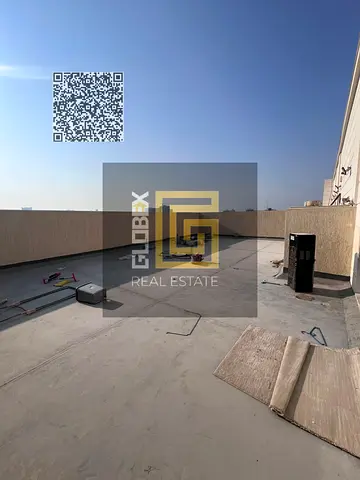 Spacious 2-bedroom apartment with a living room and a rooftop terrace available for annual rent in