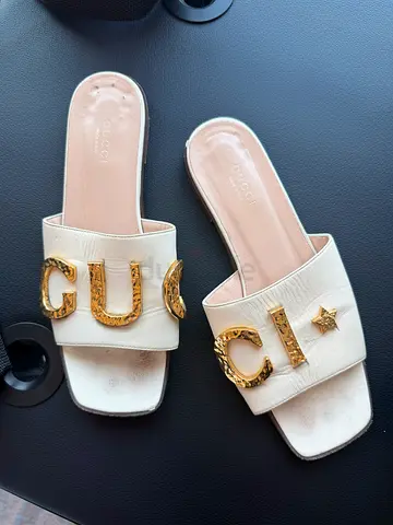 Originally Gucci White Gucci-style leather slide sandals with gold hardware - size 36