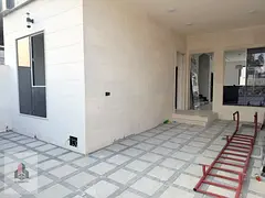 A distinctive villa for sale—registration fees included—located on a main road with a very large