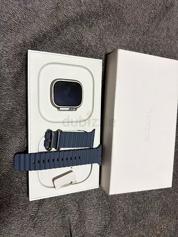 Apple Watch (with extra strap) — Good condition, original box