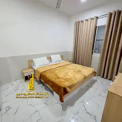 Luxury apartment (second occupancy), featuring a bedroom and a living room with an open balcony. in