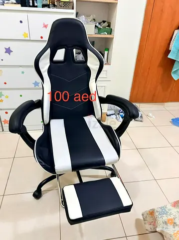 Black & white gaming/office chair with footrest - used, 100 AED